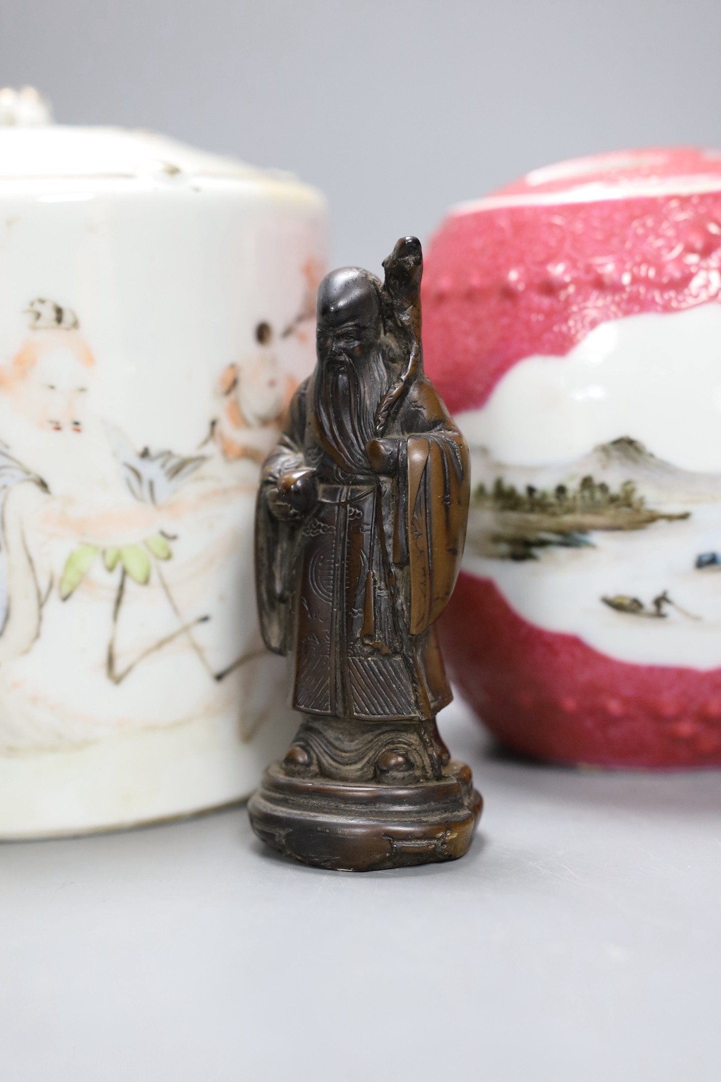 A Chinese Republic period teapot, a famille rose barrel and cover, a famille verte saucer, porcelain duck, pottery stem bowl and a resin model of Shou Lao